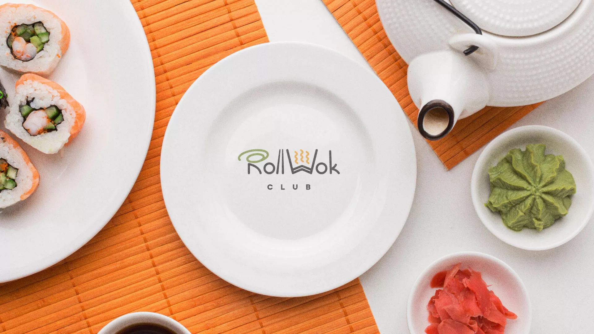 Разработка логотипа и фирменного стиля в Сосновом Боре для суши-бара «Roll Wok Club» Разработка логотипа и фирменного стиля в Сосновом Боре для суши-бара «Roll Wok Club»